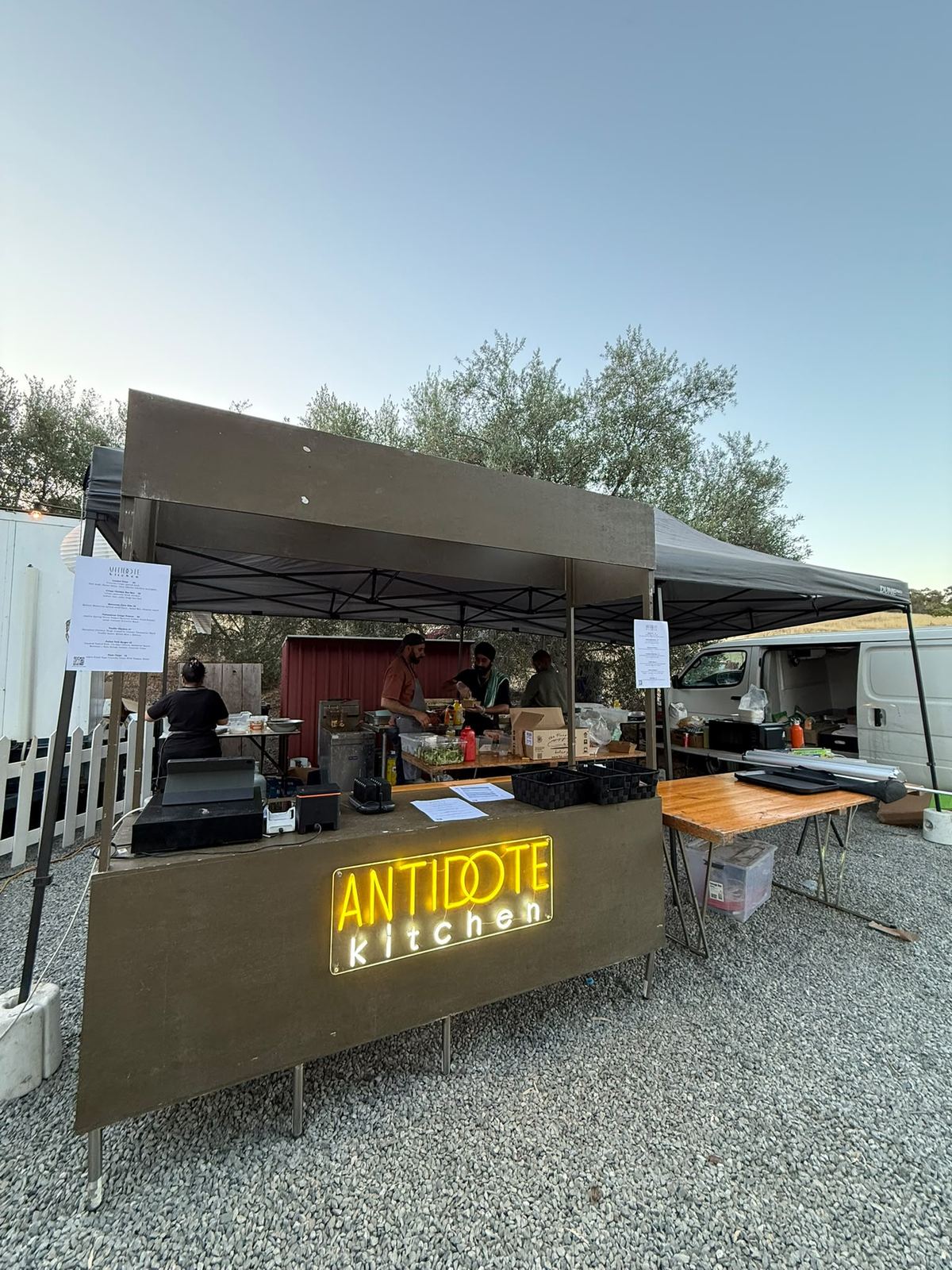 Antidote Kitchen pop-up stall with neon sign